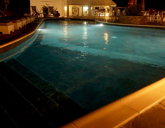 Pool and pool bar at night